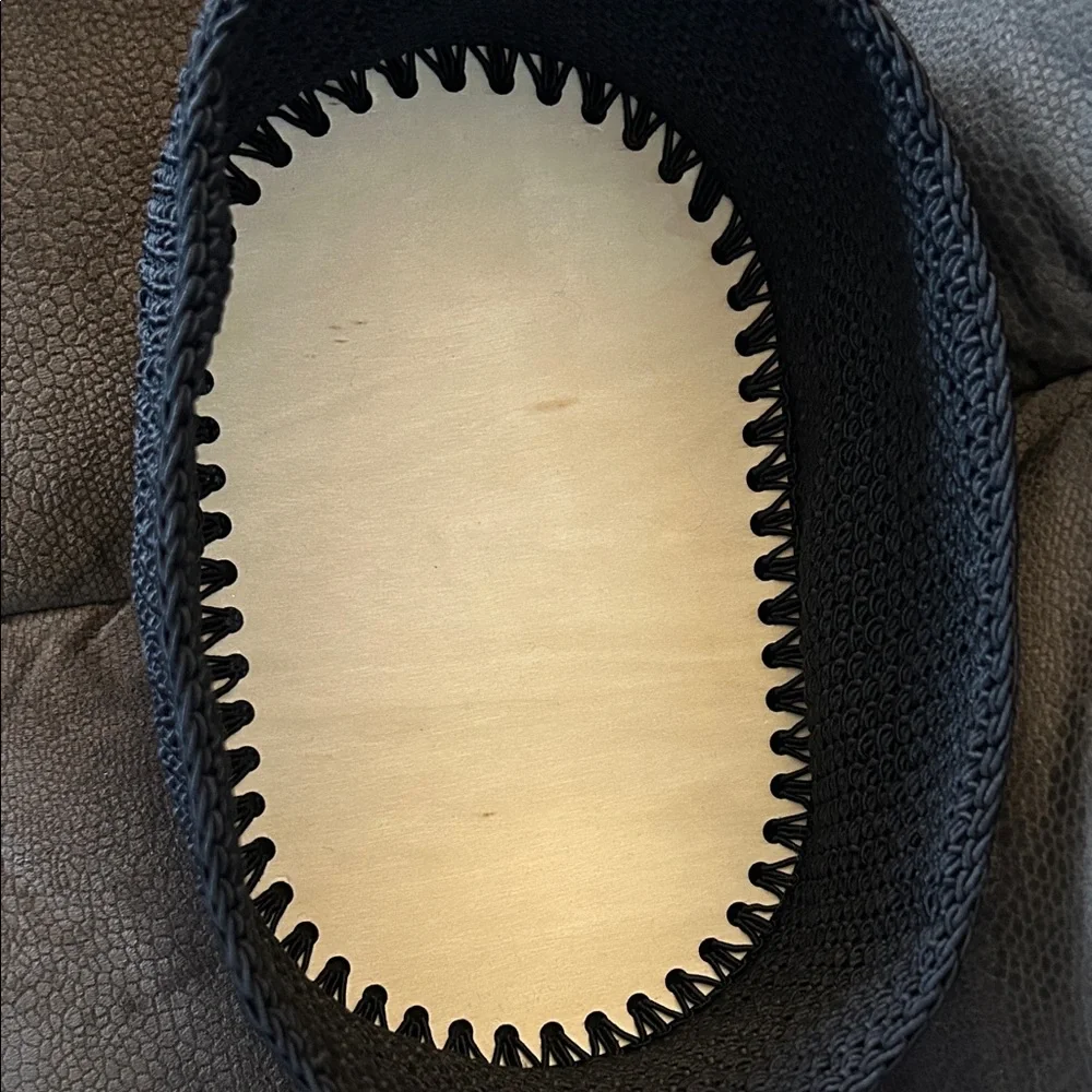 NWT Handmade Black Crocheted Basket with tan wooden bottom